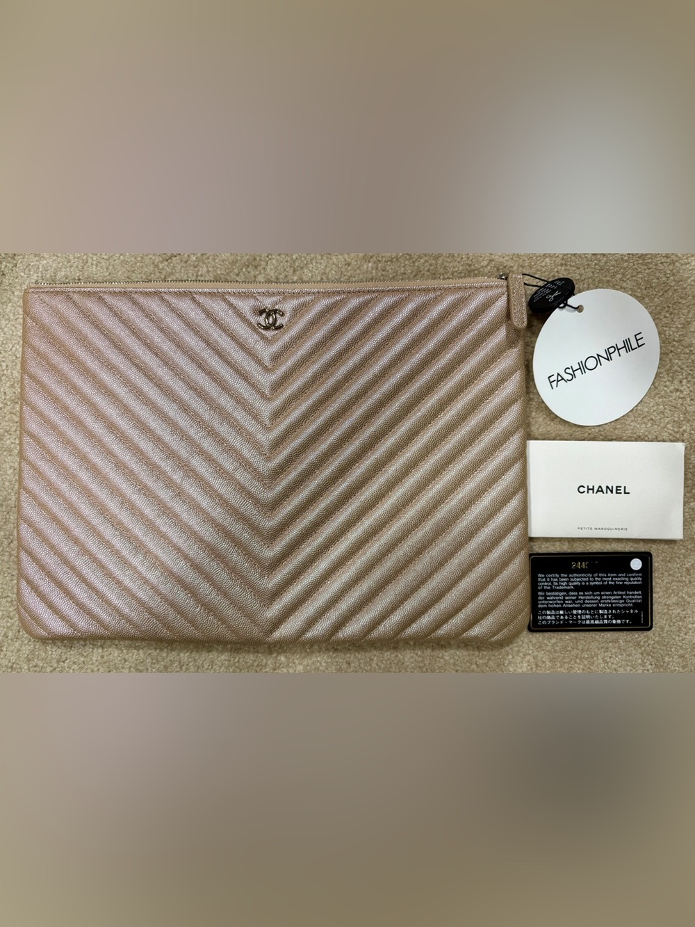 CHANEL Chevron Zip Pouch in Metallic Pink Gold